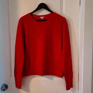 An orange sweater from the Gap, size XL